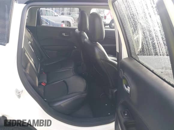 2021 Jeep Compass Altitude with VIN 3C4NJDBB6MT586270, listed as a IAAI auction lot 43250792 with 62,538 mi miles and . Bid and sale history available at DreamBid. Image 8.