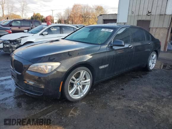 2011 BMW 7 Series 750Li xDrive with VIN WBAKC8C55BC434418, listed as a Copart auction lot 77957584 with 87,595 mi miles and Salvage title. Bid and sale history available at DreamBid. Image 1.