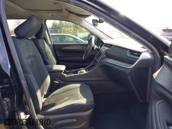 2023 Jeep Grand Cherokee Laredo with VIN 1C4RJHAG7PC600196, listed as a IAAI auction lot 41695837 with 19,110 mi miles and . Bid and sale history available at DreamBid. Image 5.