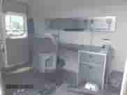 2022 Ram ProMaster Cargo z VIN 3C6LRVBG7NE109619, wystawiony jako IAAI lot #42807528 z przebiegiem 66 339 mil mil oraz . Historia ofert i sprzedaży dostępna na DreamBid. Obrazek 8.