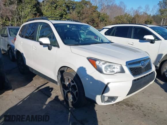 2014 Subaru Forester XT Touring z VIN JF2SJGPC9EH417920, wystawiony jako IAAI lot #41270689 z przebiegiem 184 976 mil mil oraz . Historia ofert i sprzedaży dostępna na DreamBid. Obrazek 1.
