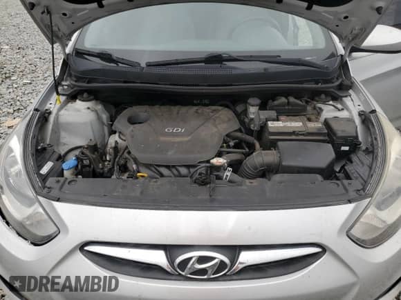2014 Hyundai Accent GLS z VIN KMHCT4AE0EU766070, wystawiony jako Copart lot #82329165 z przebiegiem 137 947 mil mil oraz Szkoda całkowita • Salvage title. Historia ofert i sprzedaży dostępna na DreamBid. Obrazek 11.