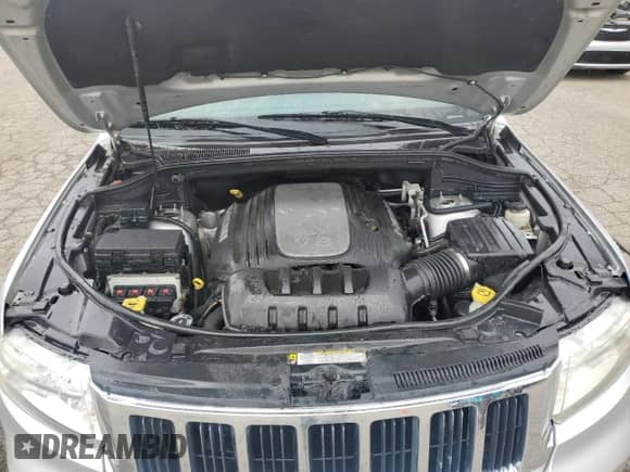 2011 Jeep Grand Cherokee Laredo с VIN 1J4RR4GT8BC636679, выставлен на аукционе Copart как лот 82121135 с пробегом 183 912 миль миль и Чистый • Clean title. История ставок и продаж доступна на DreamBid. Изображение 12.