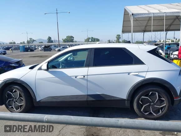 2022 Hyundai Ioniq 5 SE z VIN KM8KM4AEXNU061012, wystawiony jako IAAI lot #42363508 z przebiegiem 28 111 mil mil oraz . Historia ofert i sprzedaży dostępna na DreamBid. Obrazek 15.