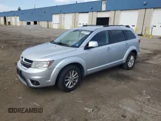 2014 Dodge Journey SXT with VIN 3C4PDCBG3ET189011, listed as a Copart auction lot 68510475 with 167,175 mi miles and Clean title. Bid and sale history available at DreamBid. Image 1.
