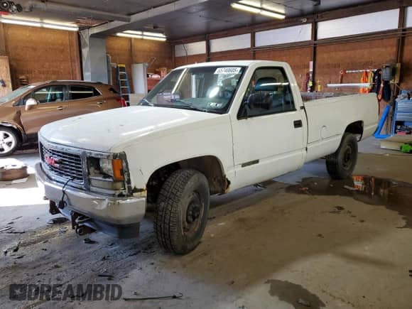 1996 GMC Sierra 1500 with VIN 1GTEK14W3TZ532945, listed as a Copart auction lot 65740605 with 120,125 mi miles and Clean title. Bid and sale history available at DreamBid. Image 1.