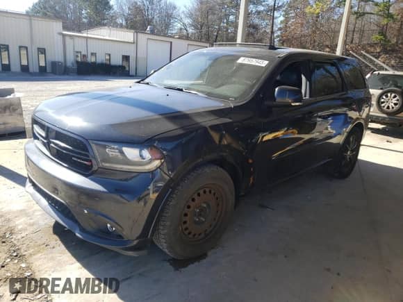2014 Dodge Durango R/T with VIN 1C4SDJCT9EC345333, listed as a Copart auction lot 87957945 with Not provided miles and Salvage title. Bid and sale history available at DreamBid. Image 1.