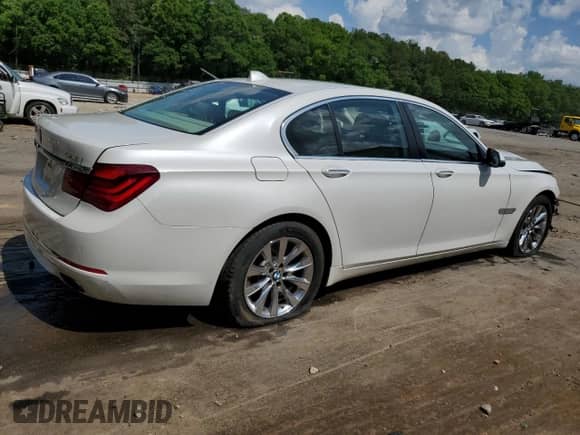 2014 BMW 7 Series 740i с VIN WBAYA6C51ED144132, выставлен на аукционе Copart как лот 55131365 с пробегом 116 826 миль миль и Списание • Salvage title. История ставок и продаж доступна на DreamBid. Изображение 3.