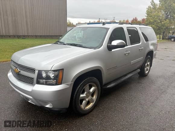 2013 Chevrolet Suburban LT with VIN 1GNSKJE71DR263248, listed as a Copart auction lot 86150925 with 197,711 mi miles and Clean title. Bid and sale history available at DreamBid. Image 2.