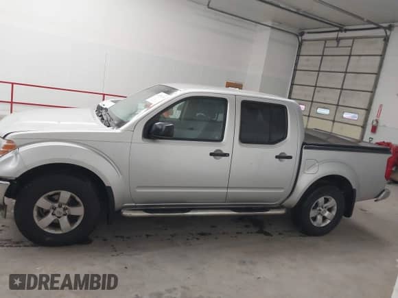 2009 Nissan Frontier SE with VIN 1N6AD07W19C408924, listed as a IAAI auction lot 41939218 with 86,138 mi miles and . Bid and sale history available at DreamBid. Image 14.