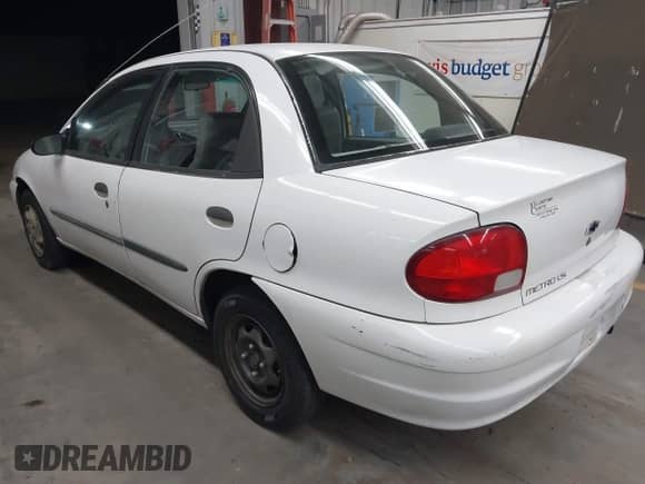 2001 Chevrolet Metro Lsi z VIN 2C1MR522816702155, wystawiony jako IAAI lot #41829889 z przebiegiem 162 769 mil mil oraz . Historia ofert i sprzedaży dostępna na DreamBid. Obrazek 3.