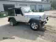2003 Jeep Wrangler Rubicon с VIN 1J4FA69SX3P322715, выставлен на аукционе Copart как лот 63976635 с пробегом 167 842 миль миль и Списание • Salvage title. История ставок и продаж доступна на DreamBid. Изображение 13.