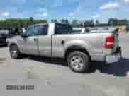 2005 Ford F-150 STX with VIN 1FTRX12W25FA37128, listed as a Copart auction lot 71256075 with 231,578 mi miles and Salvage title. Bid and sale history available at DreamBid. Image 2.