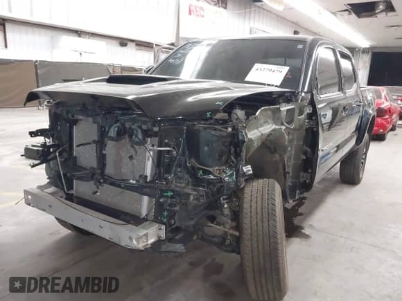 2023 Toyota Tacoma SR z VIN 3TMCZ5AN2PM574939, wystawiony jako IAAI lot #43279479 z przebiegiem 29 535 mil mil oraz . Historia ofert i sprzedaży dostępna na DreamBid. Obrazek 18.