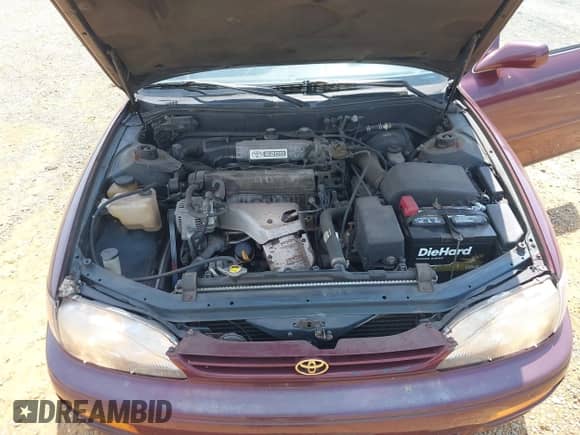 1996 Toyota Camry DX z VIN 4T1BG12K5TU928176, wystawiony jako IAAI lot #42902561 z przebiegiem 91 793 mil mil oraz . Historia ofert i sprzedaży dostępna na DreamBid. Obrazek 10.