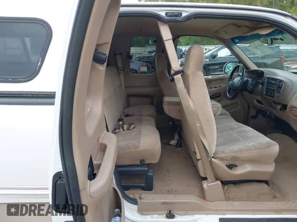 1998 Ford F-150 with VIN 1FTRX18L0WKC22686, listed as a IAAI auction lot 43270211 with 128,823 mi miles and . Bid and sale history available at DreamBid. Image 8.