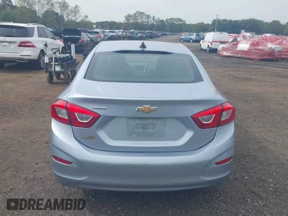 2018 Chevrolet Cruze LS with VIN 1G1BC5SM6J7193723, listed as a IAAI auction lot 43313586 with 80,781 mi miles and . Bid and sale history available at DreamBid. Image 16.