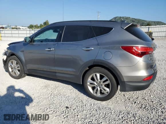 2015 Hyundai Santa Fe с VIN 5XYZWDLA7FG239808, выставлен на аукционе Copart как лот 80452375 с пробегом 128 952 миль миль и Списание • Salvage title. История ставок и продаж доступна на DreamBid. Изображение 2.