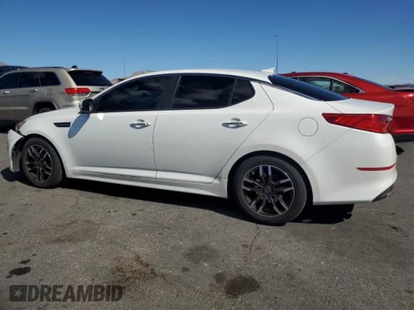 2015 Kia Optima LX z VIN KNAGM4A70F5648405, wystawiony jako Copart lot #89859585 z przebiegiem 167 302 mil mil oraz Czysty tytuł • Clean title. Historia ofert i sprzedaży dostępna na DreamBid. Obrazek 2.