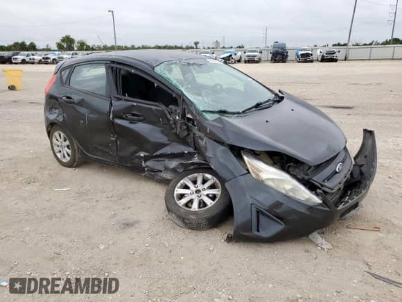 2011 Ford Fiesta SE with VIN 3FADP4EJ4BM142699, listed as a Copart auction lot 83821305 with 164,004 mi miles and Salvage title. Bid and sale history available at DreamBid. Image 4.
