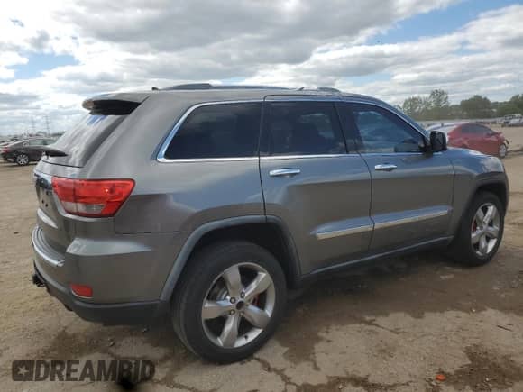 2012 Jeep Grand Cherokee Limited z VIN 1C4RJFBG5CC102608, wystawiony jako Copart lot #70375545 z przebiegiem 103 079 mil mil oraz Szkoda całkowita • Salvage title. Historia ofert i sprzedaży dostępna na DreamBid. Obrazek 3.