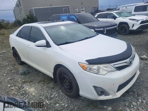 2012 Toyota Camry XLE with VIN 4T1BK1FK7CU514664, listed as a Copart auction lot 71484725 with 335,770 mi miles and Clean title. Bid and sale history available at DreamBid. Image 4.
