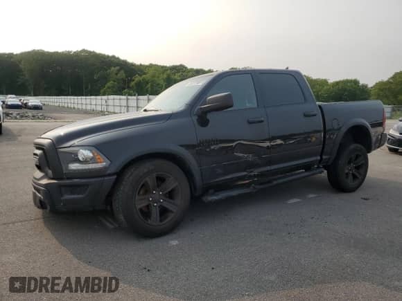 2022 Ram 1500 Warlock with VIN 1C6RR7LG4NS176079, listed as a Copart auction lot 59546315 with 106,570 mi miles and Salvage title. Bid and sale history available at DreamBid. Image 1.