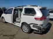 2014 Toyota Sienna XLE with VIN 5TDYK3DC9ES452147, listed as a Copart auction lot 84392215 with 161,656 mi miles and Salvage title. Bid and sale history available at DreamBid. Image 2.