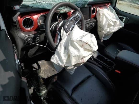 2023 Jeep Wrangler Rubicon z VIN 1C4HJXFN8PW619755, wystawiony jako Copart lot #62449735 z przebiegiem 23 910 mil mil oraz Szkoda całkowita • Salvage title. Historia ofert i sprzedaży dostępna na DreamBid. Obrazek 8.