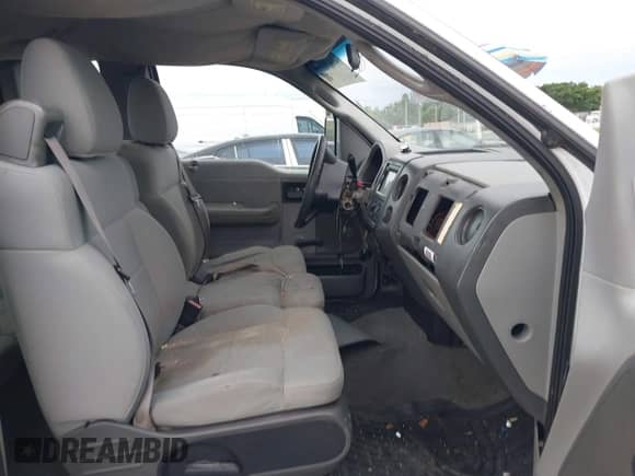 2007 Ford F-150 STX with VIN 1FTRX12W57FA72491, listed as a IAAI auction lot 43430894 with 254,244 mi miles and . Bid and sale history available at DreamBid. Image 5.