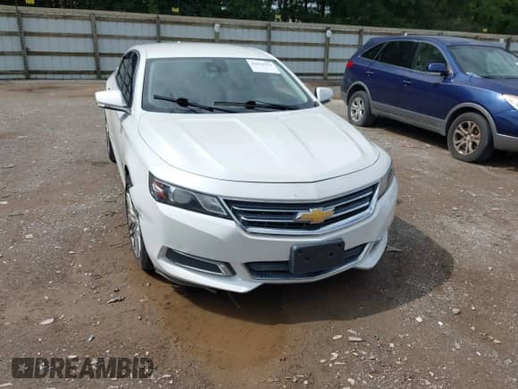 2015 Chevrolet Impala LT with VIN 1G1125S34FU123720, listed as a IAAI auction lot 42959992 with Not provided miles and . Bid and sale history available at DreamBid. Image 6.