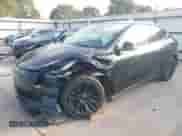 2023 Tesla Model Y Long Range z VIN 7SAYGAEE7PF767951, wystawiony jako IAAI lot #43128878 z przebiegiem 36 431 mil mil oraz . Historia ofert i sprzedaży dostępna na DreamBid. Obrazek 24.