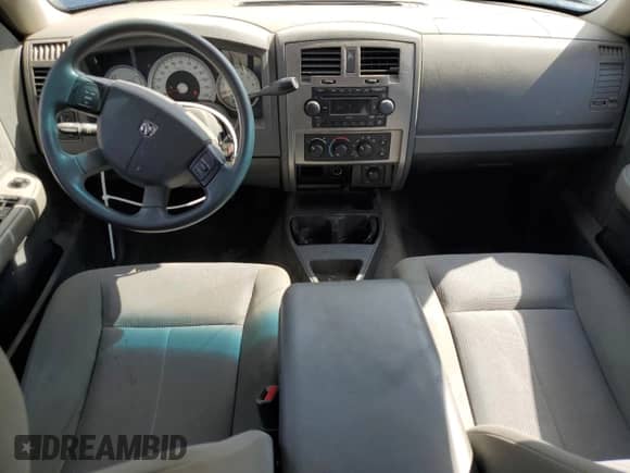 2006 Dodge Dakota SLT with VIN 1D7HW48K26S704816, listed as a Copart auction lot 56071985 with 105,189 mi miles and Salvage title. Bid and sale history available at DreamBid. Image 8.