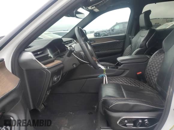 2022 Jeep Grand Cherokee Summit Reserve with VIN 1C4RJHEG1N8576763, listed as a Copart auction lot 55504685 with 56,290 mi miles and Salvage title. Bid and sale history available at DreamBid. Image 7.