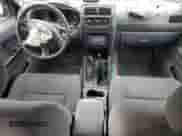 2003 Nissan Frontier XE with VIN 1N6ED29Y43C414977, listed as a Copart auction lot 43938595 with 212,303 mi miles and Salvage title. Bid and sale history available at DreamBid. Image 8.