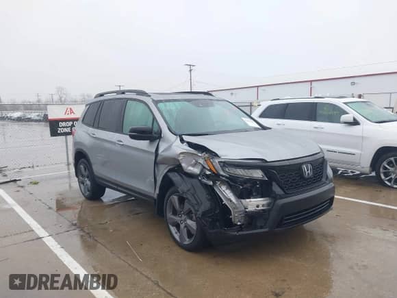 2021 Honda Passport Touring z VIN 5FNYF8H9XMB019732, wystawiony jako IAAI lot #41459208 z przebiegiem 41 745 mil mil oraz . Historia ofert i sprzedaży dostępna na DreamBid. Obrazek 6.