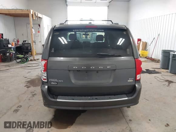 2016 Dodge Grand Caravan SXT with VIN 2C4RDGCG3GR270420, listed as a IAAI auction lot 43144301 with 102,734 mi miles and . Bid and sale history available at DreamBid. Image 16.