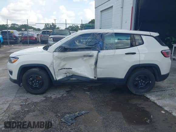 2018 Jeep Compass Sport with VIN 3C4NJCAB5JT263450, listed as a IAAI auction lot 42288257 with 115,860 mi miles and . Bid and sale history available at DreamBid. Image 14.