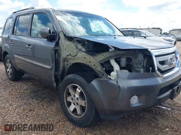 2010 Honda Pilot Touring with VIN 5FNYF3H9XAB008986, listed as a IAAI auction lot 42488828 with 126,662 mi miles and . Bid and sale history available at DreamBid. Image 1.