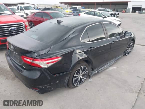 2019 Toyota Camry LE с VIN 4T1B11HK2KU833243, выставлен на аукционе IAAI как лот 42855313 с пробегом 128 404 миль миль и . История ставок и продаж доступна на DreamBid. Изображение 4.