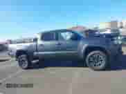 2020 Toyota Tacoma SR5 with VIN 3TMDZ5BNXLM084553, listed as a IAAI auction lot 42556448 with 74,634 mi miles and . Bid and sale history available at DreamBid. Image 14.