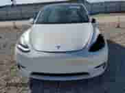 2022 Tesla Model Y Long Range с VIN 7SAYGDEE4NF339544, выставлен на аукционе Copart как лот 84565635 с пробегом 54 231 миль миль и Списание • Salvage title. История ставок и продаж доступна на DreamBid. Изображение 5.