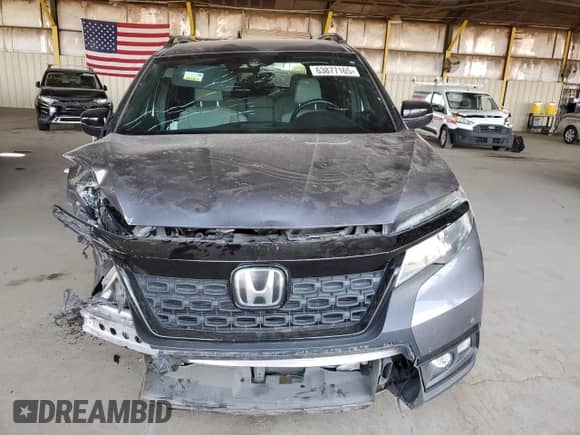 2020 Honda Passport Touring with VIN 5FNYF7H90LB003869, listed as a Copart auction lot 63877165 with 57,387 mi miles and Salvage title. Bid and sale history available at DreamBid. Image 5.