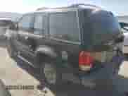 1998 Ford Explorer with VIN 1FMYU22E0WUD43223, listed as a Copart auction lot 64430825 with 180,159 mi miles and Salvage title. Bid and sale history available at DreamBid. Image 2.
