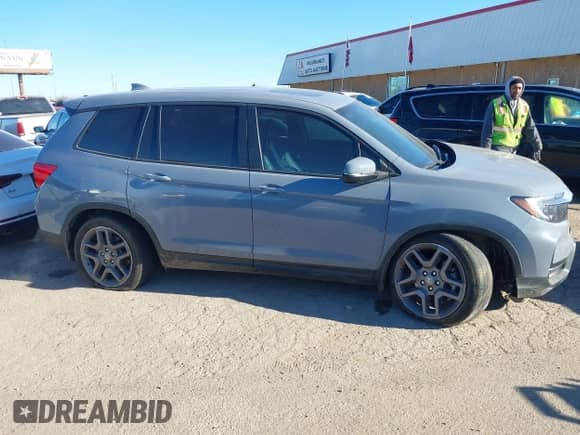 2022 Honda Passport EX-L с VIN 5FNYF7H57NB005716, выставлен на аукционе IAAI как лот 41078499 с пробегом 33 141 миль миль и . История ставок и продаж доступна на DreamBid. Изображение 13.