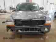 2003 Dodge Dakota Sport с VIN 1D7HL38N13S105320, выставлен на аукционе Copart как лот 84075524 с пробегом 159 708 миль миль и На запчасти • Non repairable. История ставок и продаж доступна на DreamBid. Изображение 5.