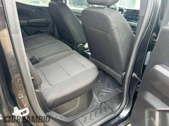 2023 Chevrolet Colorado 2WD Work Truck с VIN 1GCGSBEC4P1266424, выставлен на аукционе Copart как лот 84060865 с пробегом 9 235 миль миль и Чистый • Clean title. История ставок и продаж доступна на DreamBid. Изображение 6.