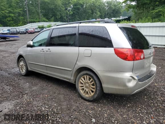 2010 Toyota Sienna XLE with VIN 5TDDK4CC3AS031671, listed as a Copart auction lot 67005405 with 155,177 mi miles and Clean title. Bid and sale history available at DreamBid. Image 2.