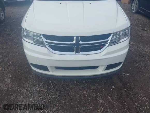 2014 Dodge Journey American Value with VIN 3C4PDCAB9ET198575, listed as a IAAI auction lot 42872868 with 214,944 mi miles and . Bid and sale history available at DreamBid. Image 6.