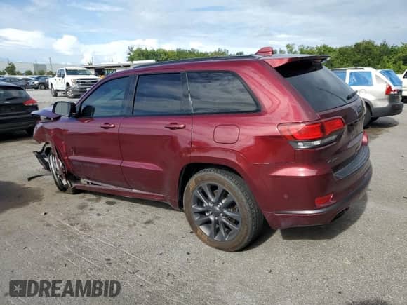 2018 Jeep Grand Cherokee High Altitude z VIN 1C4RJFCG2JC446070, wystawiony jako Copart lot #69920235 z przebiegiem 104 015 mil mil oraz Szkoda całkowita • Salvage title. Historia ofert i sprzedaży dostępna na DreamBid. Obrazek 2.